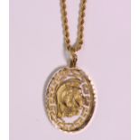 18k and 14k yellow gold pendant-necklace featuring the head of a Roman solider accented by