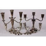 (lot of 6) American sterling silver weighted three light candelabra and low candlestick group,