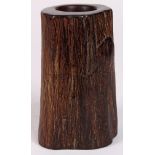 Chinese wooden brush pot, in the form of a tree trunk with a contour textured exterior, 6"h