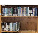 Two shelves of VHS tapes relating to Natural History