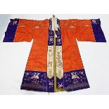 Chinese theatrical robe, in the form of a Daoist robe with gilt couching on a silk red ground, 56.