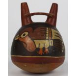 Pre-Columbian Peruvian Nazca stirrup vessel, having polychrome decoration of a bird, 6"h