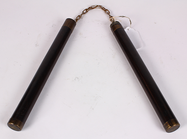 Chinese wooden nunchucks/baton, the two rods linked by a chain and screws together to form a