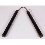 Chinese wooden nunchucks/baton, the two rods linked by a chain and screws together to form a