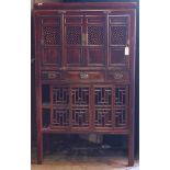 Chinese lacquered kitchen cabinet, with four hinged doors to the upper section, above three