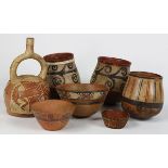 (lot of 7) Pre-Columbian vessel and bowl group, including polychrome decorated examples, a stirrup