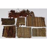 (lot of 7) Pre-Columbian textile and weaving fragments, including two with bird and geometric