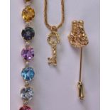 (Lot of 2) Synthetic treated colored stone, and 14k yellow gold jewelry including one 14k yellow