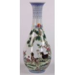 Chinese enameled porcelain bottle vase, the trumpet neck set above the pear shaped body decorated