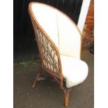 A upholstered wicker chair