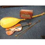 A German squeeze box, Violin & Two bows and a Sitar