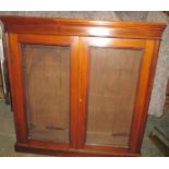 A 19th C mahogany adjustable shelf glazed door bookcase