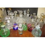 A large quantity of vintage scent bottles and dressing table jars