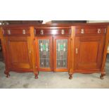 A large mahogany sideboard with leadlight glazed