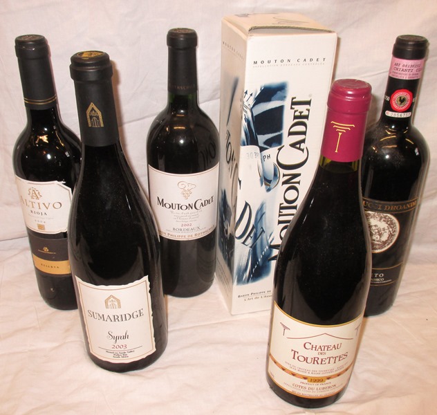 6 bottles of vintage red wine to include Mouton Cadet  by Baron Philippe De Rothschild