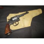 A Smith & Wesson .38 revolver with holster and deactivation certificate