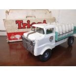 A vintage Triang milk lorry with original box