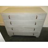 A painted chest of 4 straight drawers