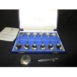 A boxed set of sterling silver Royal spoons and other silver items