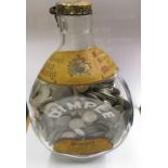 A John Haig 'Dimple' bottle containing silver and later 6d pieces
