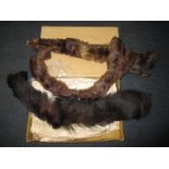 Three natural fur stoles