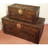 Two oriental carved wood blanket boxes