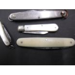 4 Antique penknives one with a silver blade