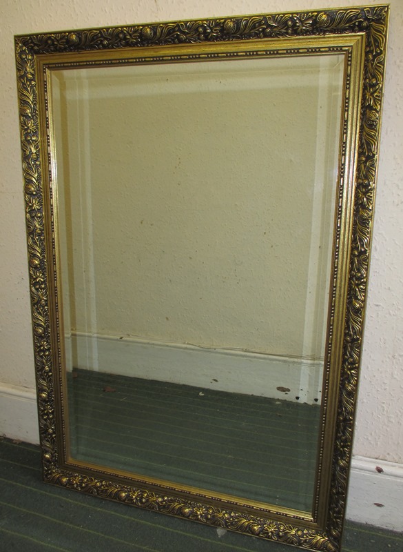 A modern gilt framed mirror