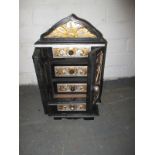 An oriental wood jewellery cabinet