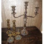 A plated 3 branch candelabra and 2 pairs of brass candlesticks