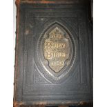 A 19th Century, leather and brass bound family bible