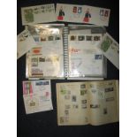 Approximately 100 1960's/70's first-day covers and an album of world stamps