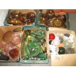 A large quantity of vintage coloured glass items