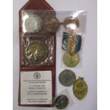 A wwI medal and assorted medallions