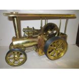 A Wilesco brass live steam traction engine