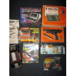 A quantity of retro electronic games to include a Binatone TV games console
