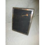 A sterling silver photo frame hallmarked Birmingham 1916