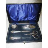 A boxed sterling silver manicure set by Boots Pure Drug Co c1915