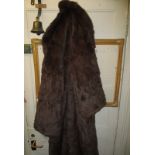 A natural fur coat and a stole
