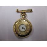 A vintage fob watch the case marked 14k with a 9ct gold clip