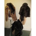 A quantity of vintage natural fur jackets and stoles