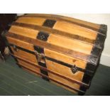 A domed top pirate type storage trunk