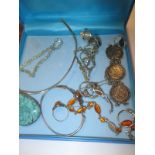 A quantity of silver jewellery to include a coin bracelet