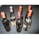 Six bottles of vintage red wine