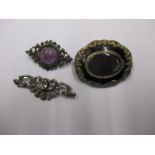 3 Silver brooches one a Victorian mourning brooch