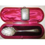 A boxed Victorian fruit spoon and a silver vesta case