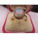 A 9ct gold and opal ring