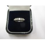 An 18ct white gold ring set with 5 good diamonds