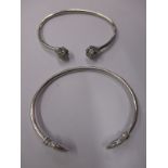 Two child's wrist bangles one silver the other 9ct white gold