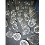 A quantity of hand cut lead crystal and other drinking glasses